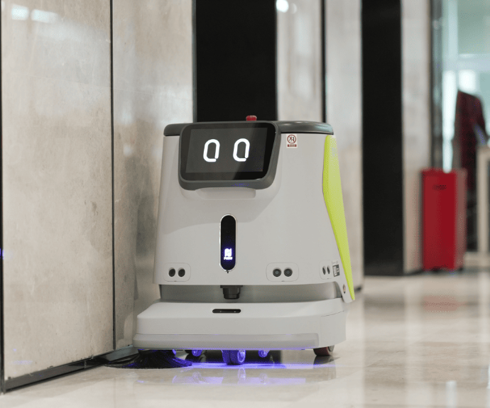 PUDU CC1 – Professioneller Reinigungsroboter / Professional cleaning robot – yellow green version